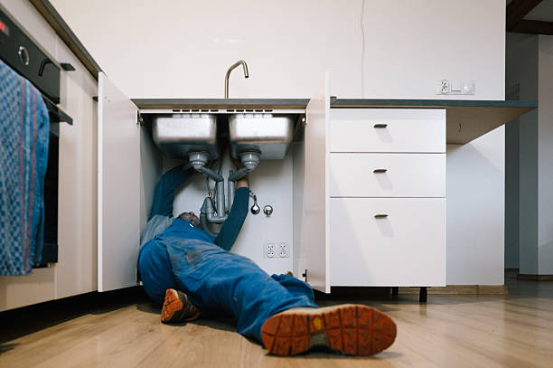 Professional Drain Cleaning technician working in Millington, MI